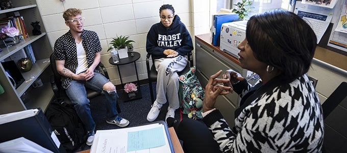 students meet with advisor in office at Pitt-Bradford