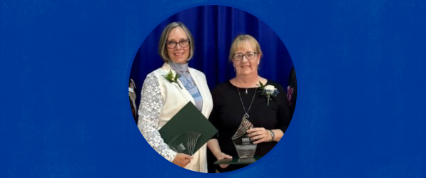 Susan Lucas and Dawna Cerney accepting an award